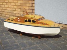 A large, scratch built, model cabin cruiser with electric motor, approximately 120 cm (l),
