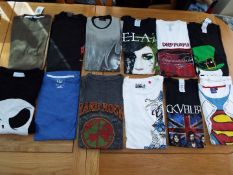 A job lot of 12 various tee shirts, predominantly pictorial images on various colours,