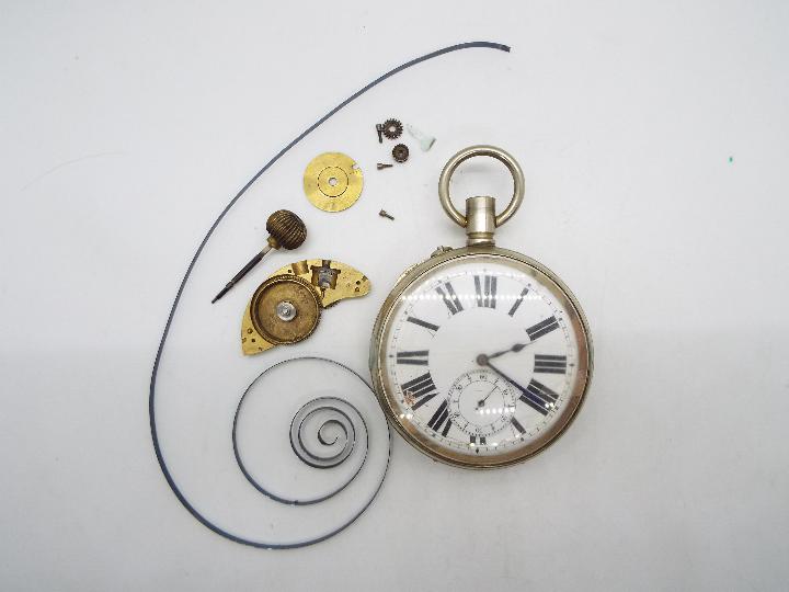 A white metal Goliath pocket watch (A/F)