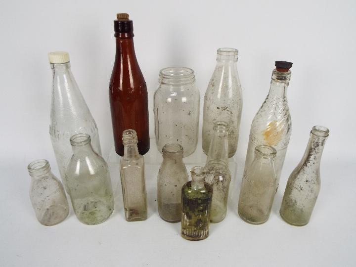 A collection of vintage glass bottles.