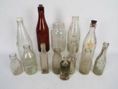 A collection of vintage glass bottles.