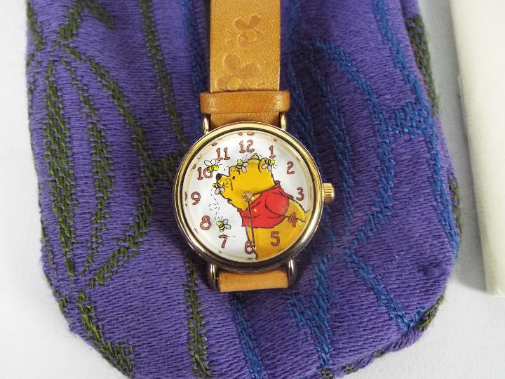 A collection of watches to include an Opex Snoopy watch, Timex Winnie The Pooh and similar. - Image 2 of 5