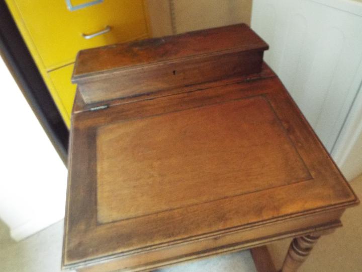 A Victorian davenport with cupboard to the side enclosing four drawers, brass castors, - Image 6 of 7