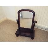 A mahogany vanity mirror,