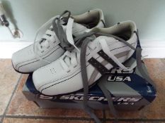 Skechers USA - a pair of black Genesis-S