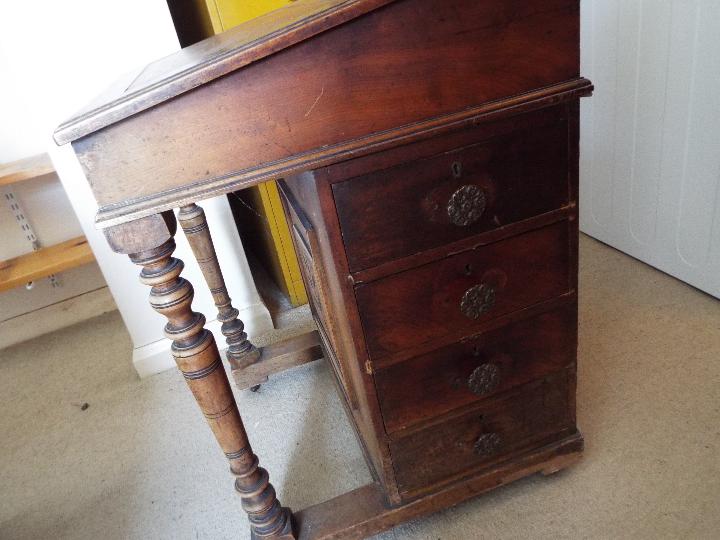 A Victorian davenport with cupboard to the side enclosing four drawers, brass castors, - Image 2 of 7