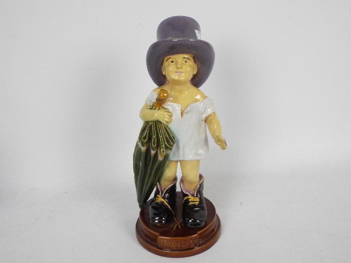 A Brownfield figurine depicting a child