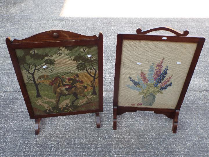 Two wood framed, needlework fire screens