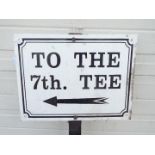 A 'To the 7th. Tee' golf-course sign. Ap