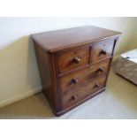 A mahogany chest of two over two drawers