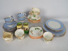 Tea wares to include Doulton and Fenton Bone China and a pair of Royal Doulton Dutch Series Ware