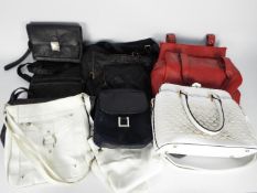 A collection of handbags and purses.