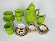 A Carlton Ware coffee service comprising coffee pot, sugar bowl and cream jug,