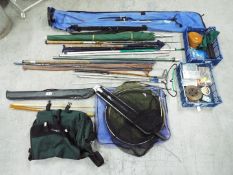 Lot to include rods, nets, reel and various other accessories,