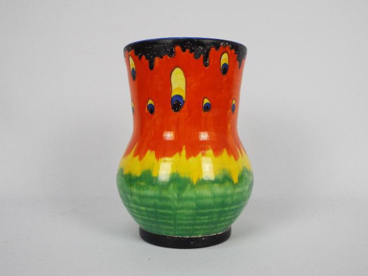 A Crown Ducal Firefly pattern vase, approximately 18 cm (h).