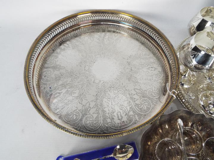 A collection of plated ware to include coffee pot, trays, napkin rings, goblets and similar. - Image 2 of 4