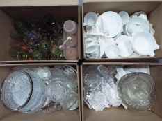 Four boxes of mixed glassware, Pyrex and similar.