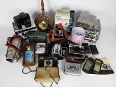 Lot to include cameras, vintage radio, mobile phones, barometer and similar.
