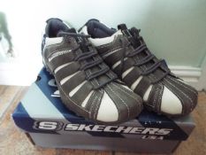 Skechers - a pair of grey and white, city-walk viaduct trainers, size 41 (EU), 7 (UK),