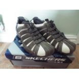 Skechers - a pair of grey and white, city-walk viaduct trainers, size 41 (EU), 7 (UK),