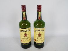 Jameson - Two 1 litre bottles of triple distilled Irish whiskey, 40% ABV.