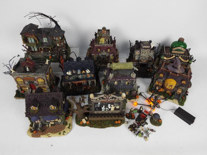 A collection of Hawthorne Village The Munsters Halloween Village models