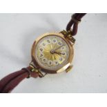 A lady's 9ct gold cased wrist watch.