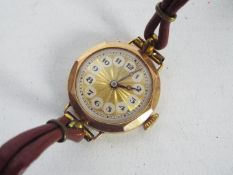 A lady's 9ct gold cased wrist watch.