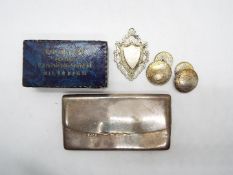 An Edward VII silver card case, Birmingham assay 1905, sponsors mark for Henry Williamson Ltd,