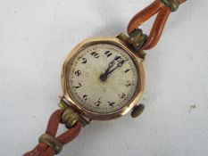 A 9ct gold cased lady's wrist watch.