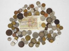 A quantity of Commonwealth and foreign coins and banknote.