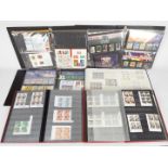 Philately - A collection of mint stamps, presentation packs and partial sheets,