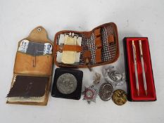 Mixed lot to include filigree brooch in the form of a butterfly, a similar pill box, pen set,