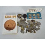 A collection of predominantly foreign coins with a small quantity of UK with a 1971 Isle Of Man