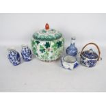 A collection of Oriental ceramics, predominantly blue and white, largest approximately 20 cm (h).