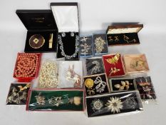 Costume jewellery to include necklaces, brooches, earrings and similar.