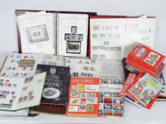 Philately - A collection of stamp albums containing used and mint stamps,