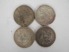 US Silver Coins - Three Morgan Dollars to include 1879, Philadelphia mint, 1880,