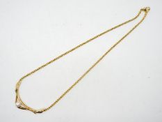 A 9ct yellow gold necklace set with single pearl, approximately 42 cm (l) and 11.