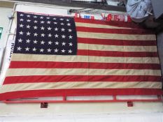 A large original 48 Star America Flag previously purchased by the vendor from an auction conducted