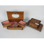 A vintage marquetry, musical cigarette box and a musical jewellery box.