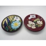 Moorcroft - Two Moorcroft Pottery trial coasters, impressed and painted marks to the base,