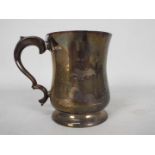 A silver tankard, of Sheffield assay, approximately 390 grams / 12.5 ozt.