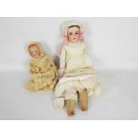 Armand Marseille - A bisque shoulder / head doll with kid leather body, weighted eyes,