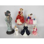 A collection of figurines, predominantly Royal Doulton with one Lladro,