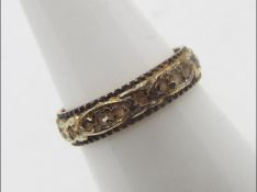 A 9ct gold eternity ring, size O, approximately 2.6 grams all in.