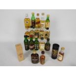 A collection of twenty whisky miniatures to include Knockando, Glenfiddich, Glenfarclas, Jura,