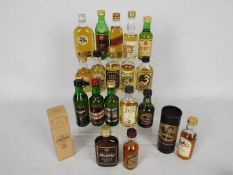 A collection of twenty whisky miniatures to include Knockando, Glenfiddich, Glenfarclas, Jura,