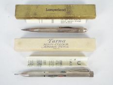 A sterling silver Turna Multi-Coloured Automatic Pencil, London import marks and dated 1937,