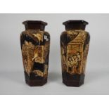 A pair of Bretby Pottery hexagonal section vases with Oriental style decoration,